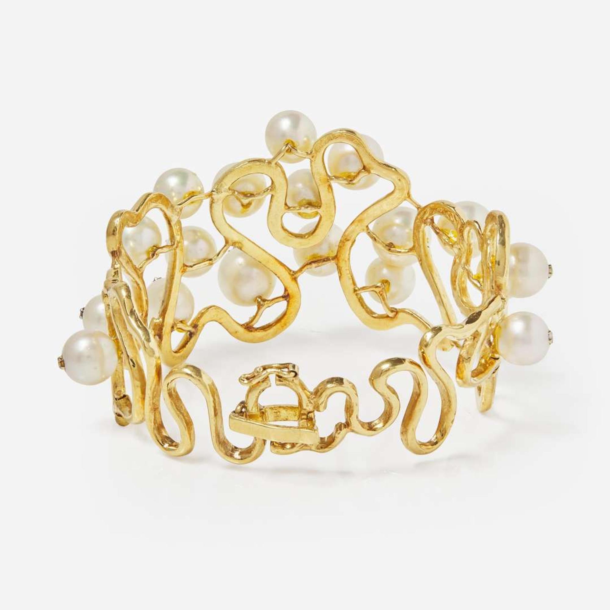 An 18K Yellow Gold, Pearl, and Diamond Bracelet