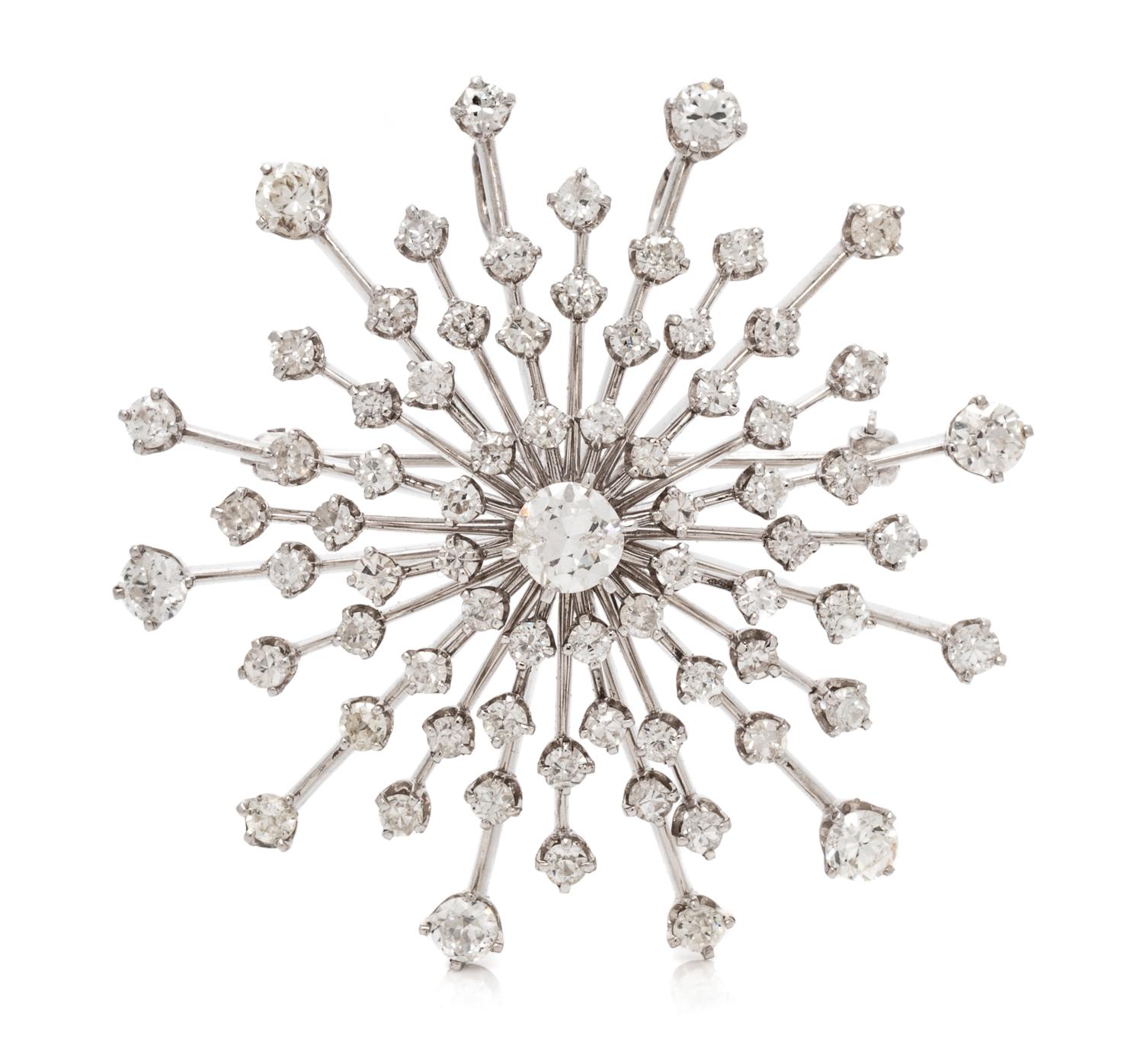 A Platinum, White Gold and Diamond Pendant/Brooch, 13.40 dwts.