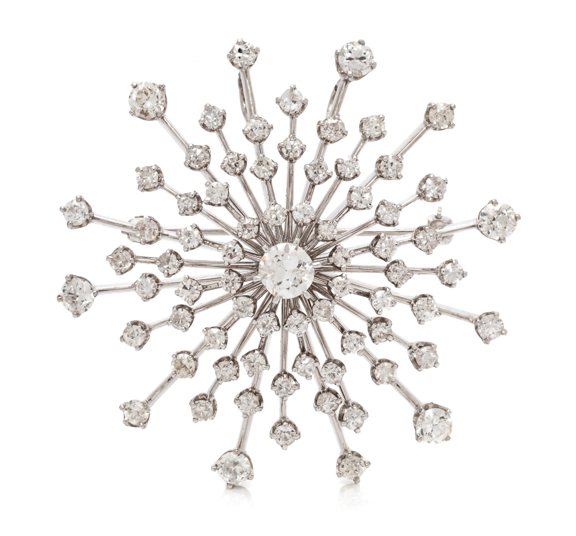 A Platinum, White Gold and Diamond Pendant/Brooch, 13.40 dwts.