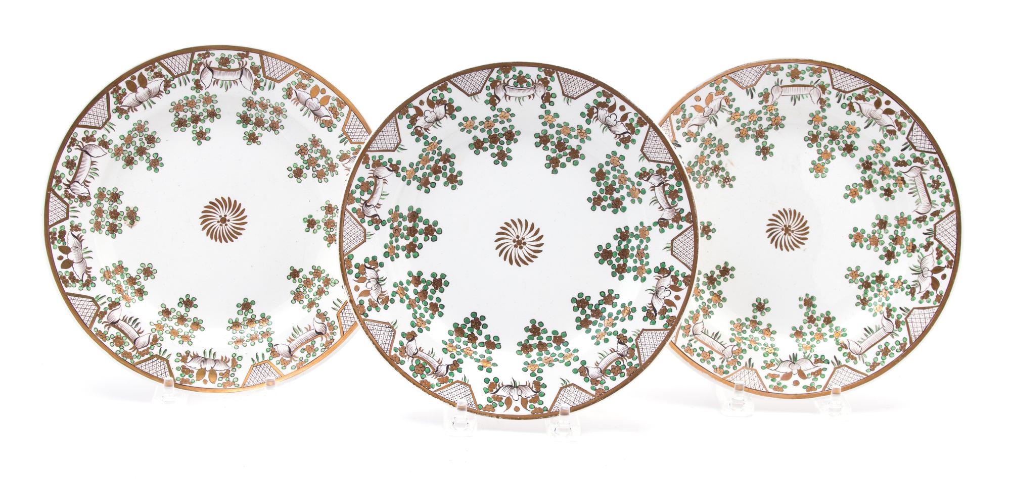 A Set of Six Gilt-Decorated Earthenware Salad Plates