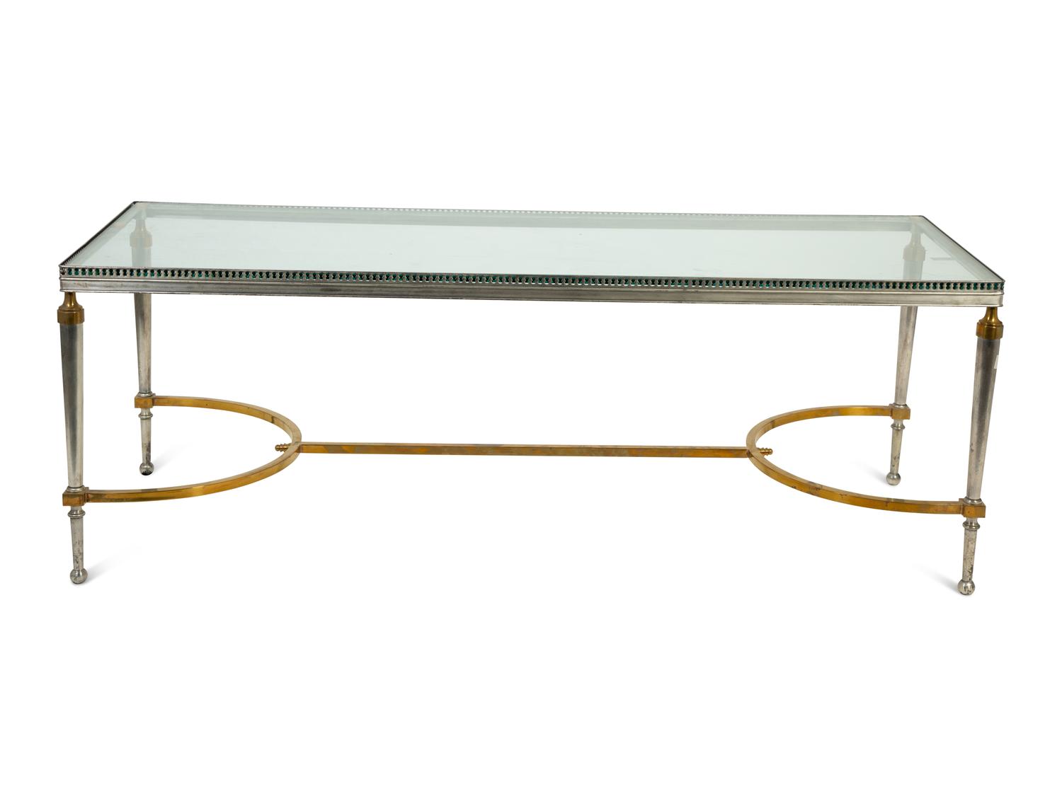 A Steel and Brass Low Table Attributed to Maison Jansen — 20TH CENTURY