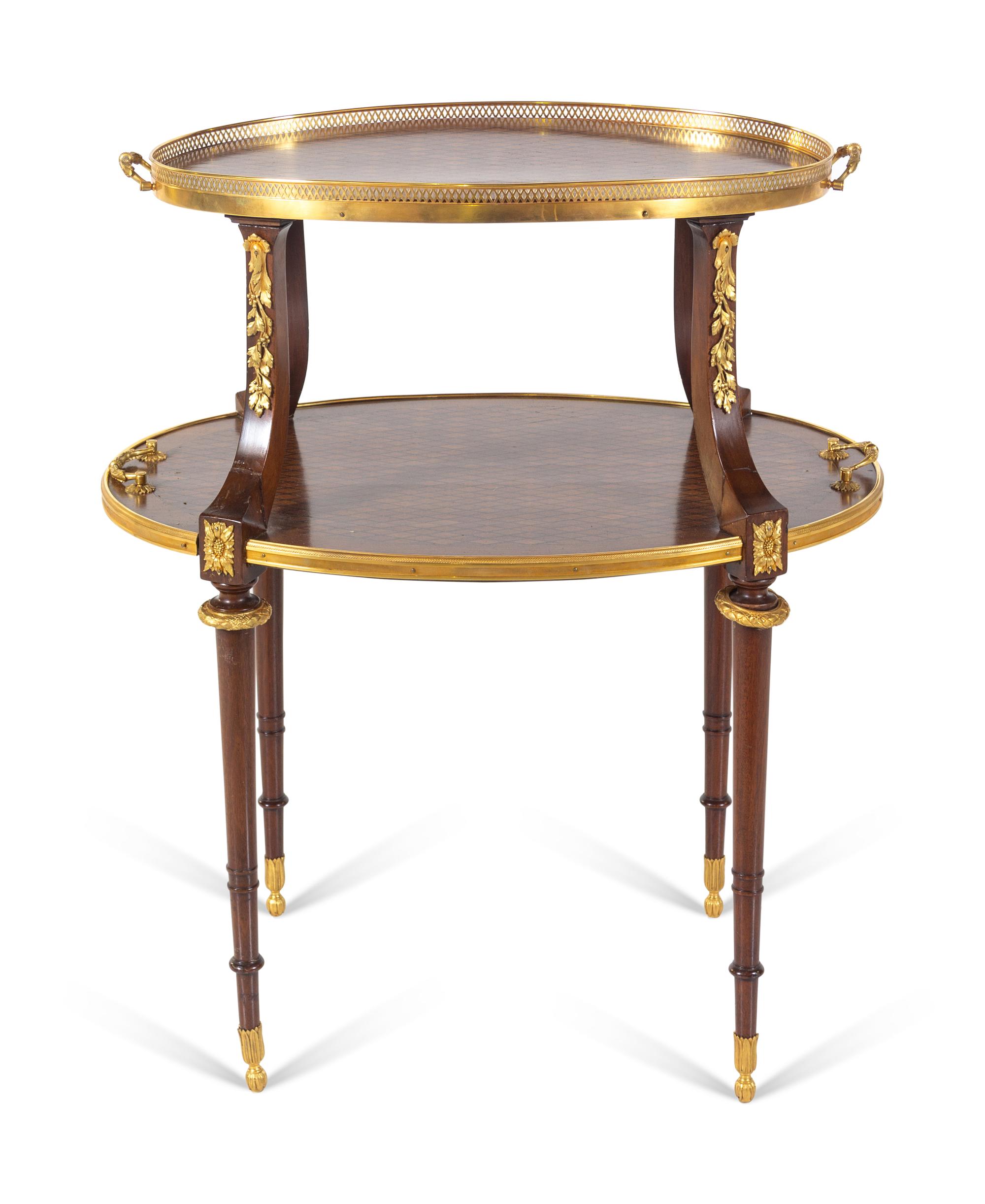 A Louis XVI Style Gilt Bronze Mounted Parquetry Two-Tier Table