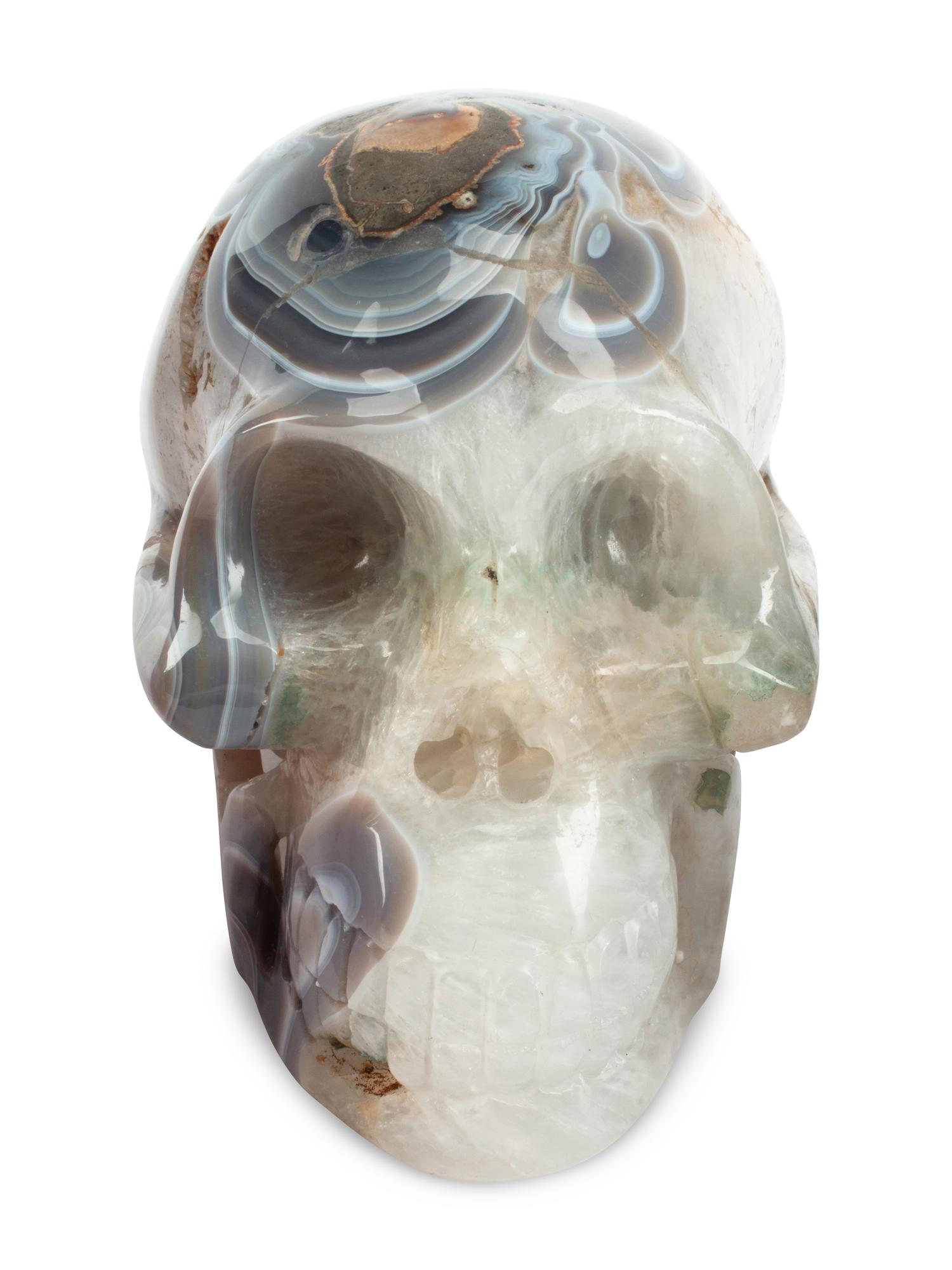 A Set of Three Carved Semi-Precious Stone Skulls