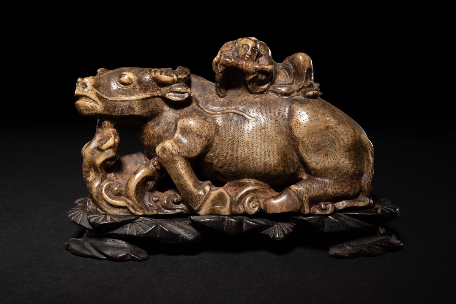 A Pair of Chinese Brown Hardstone 'Ox and Herd' Figural Groups