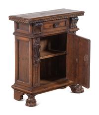 A Baroque Carved Walnut Cabinet