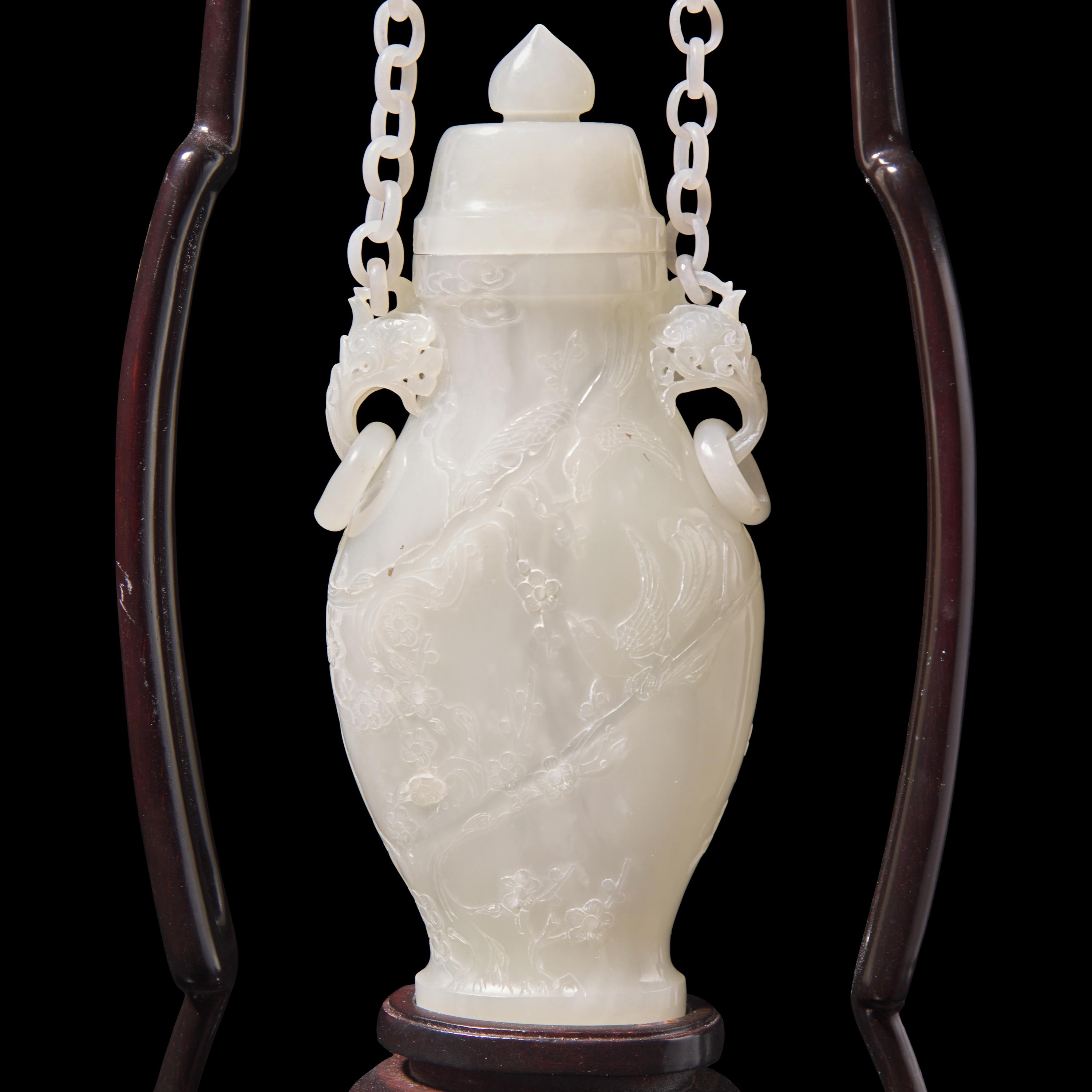 A Chinese Carved Jade Hanging Vase, 20th Century — 近代 花鳥紋玉鏈瓶