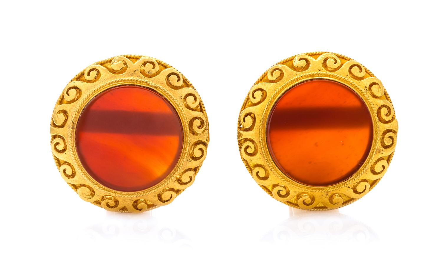 A Pair of 18 Karat Yellow Gold and Carnelian Earclips, 21.90 dwts.