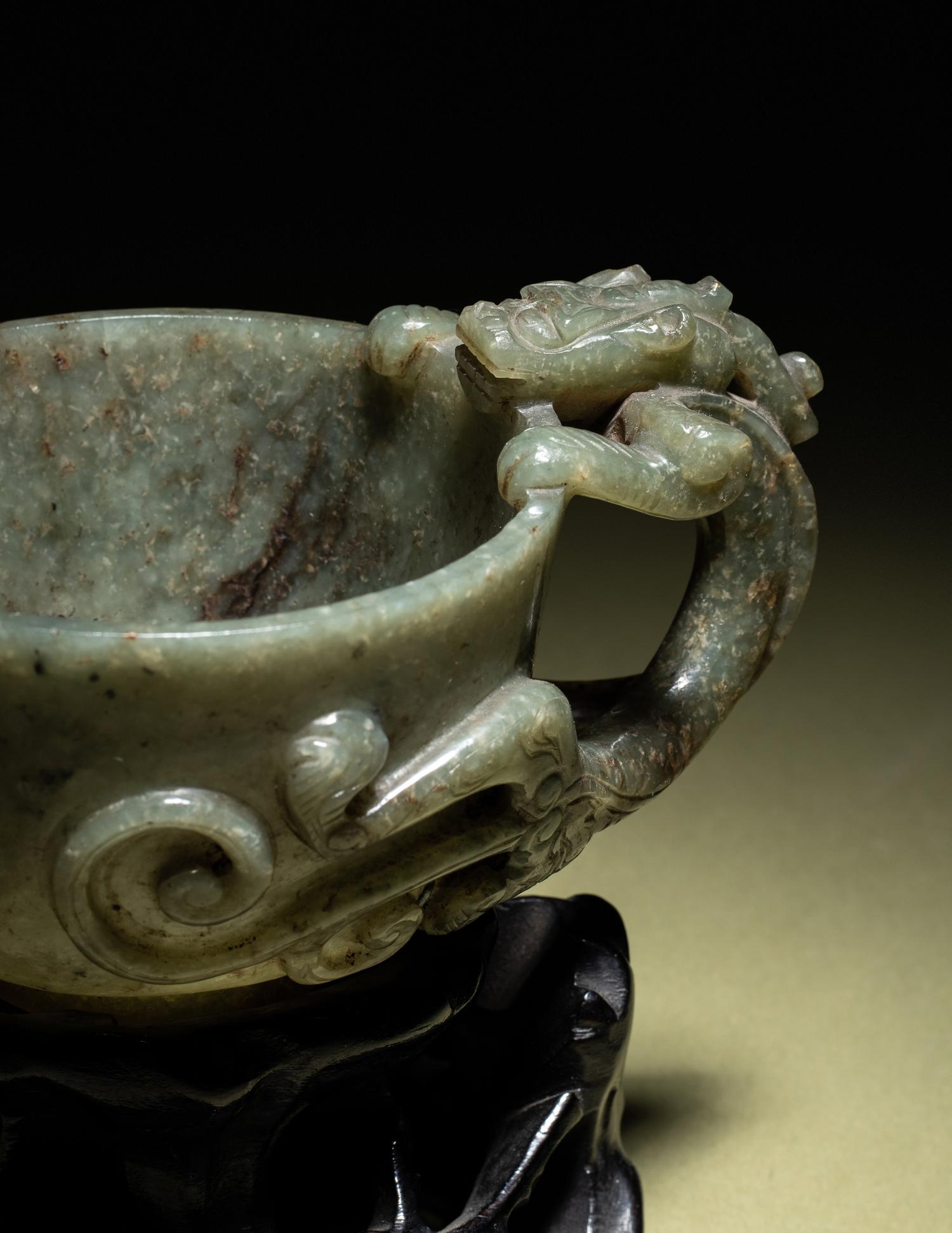 A Grey and Celadon Jade 'Dragon' Handled Cup