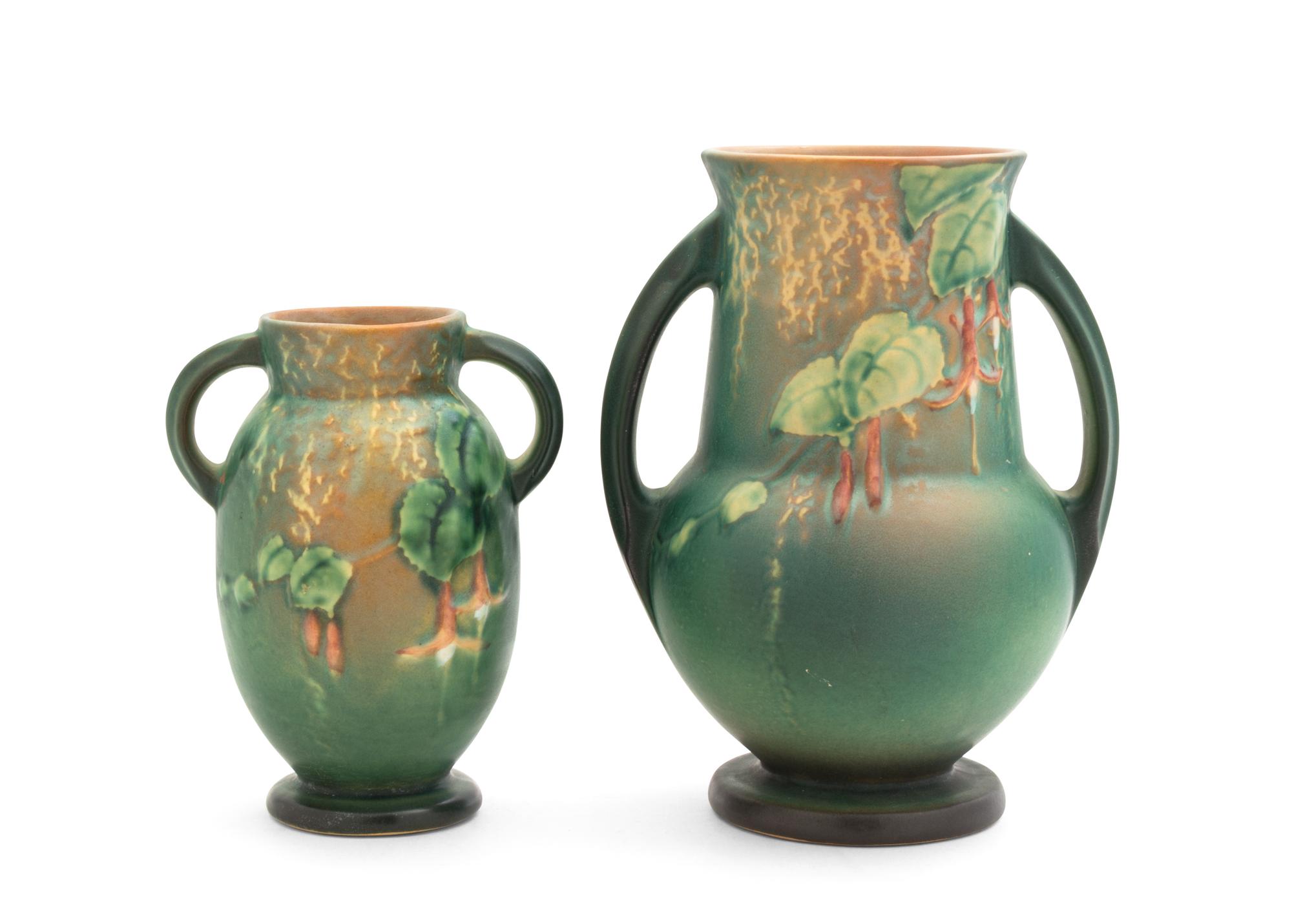 Two Roseville Fuchsia Pottery Vases Height of first 8 1/4 inches, second 6 1/4 inches.