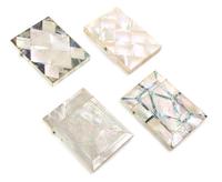 A Collection of Four Mother-of-Pearl Veneered Card Cases, Height of tallest 4 1/4 inches.