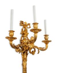 A Pair of Louis XVI Style Gilt Bronze Three-Light Sconces