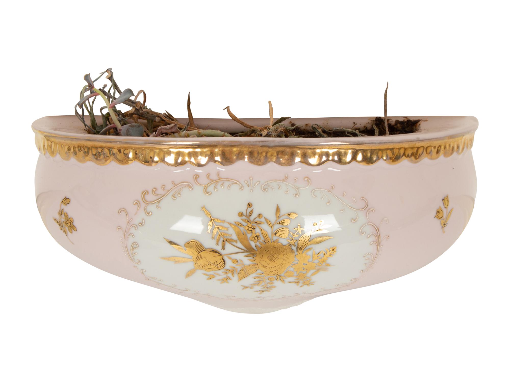 A French Porcelain Lavabo and Basin with Bisque Figures