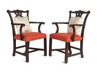 A Pair of George III Style Carved Mahogany Armchairs