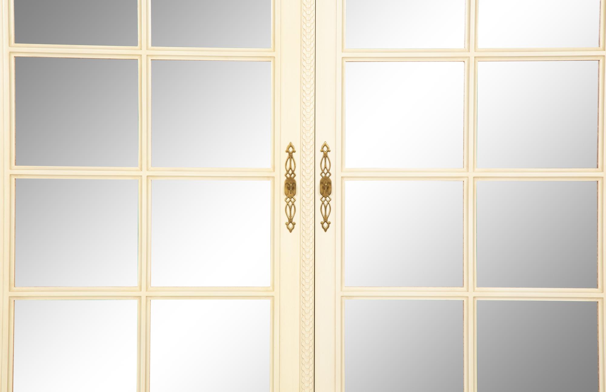 A Louis XVI Style White Painted Four-Door Armoire by Julia Gray, New York