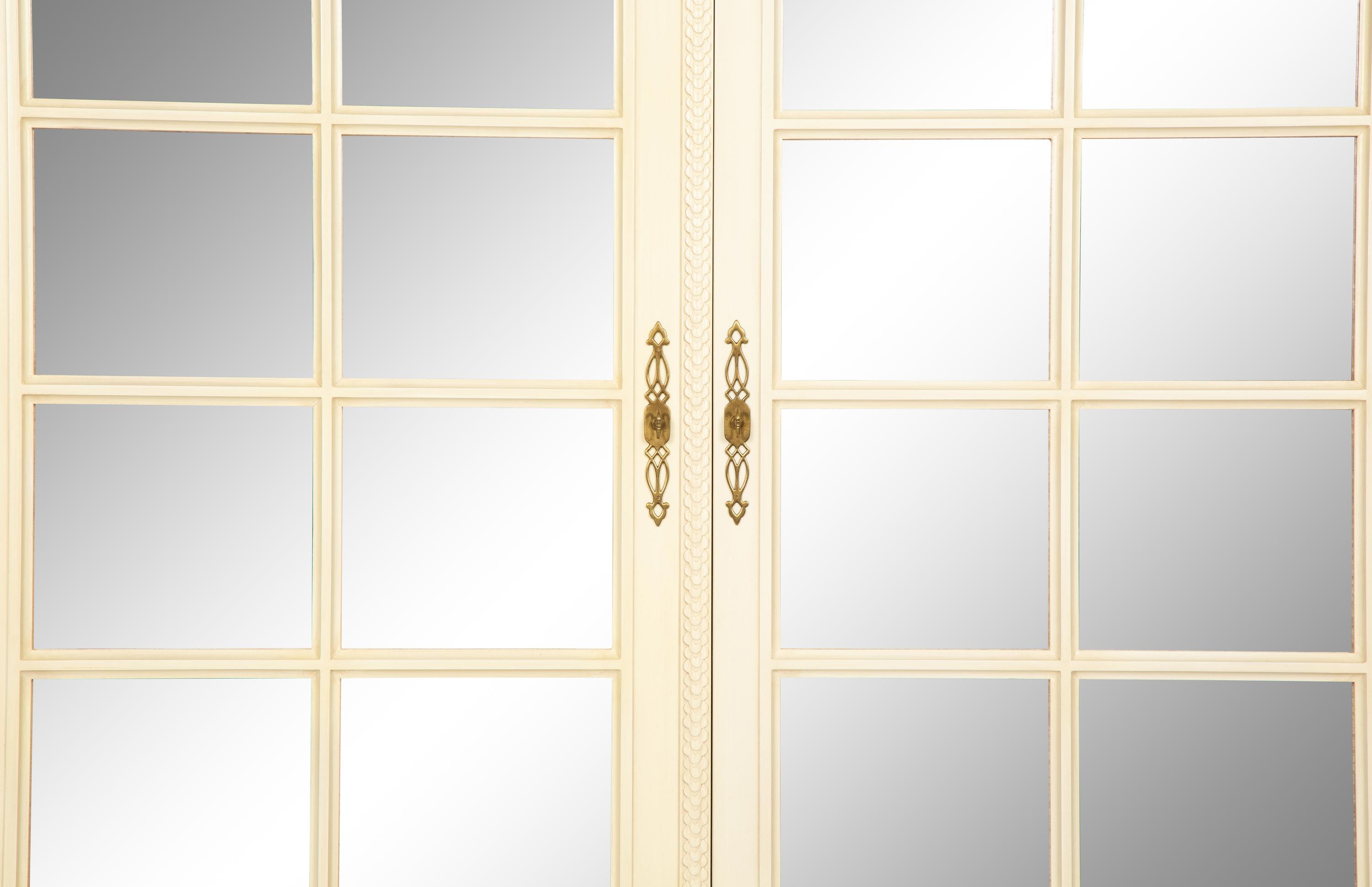 A Louis XVI Style White Painted Four-Door Armoire by Julia Gray, New York