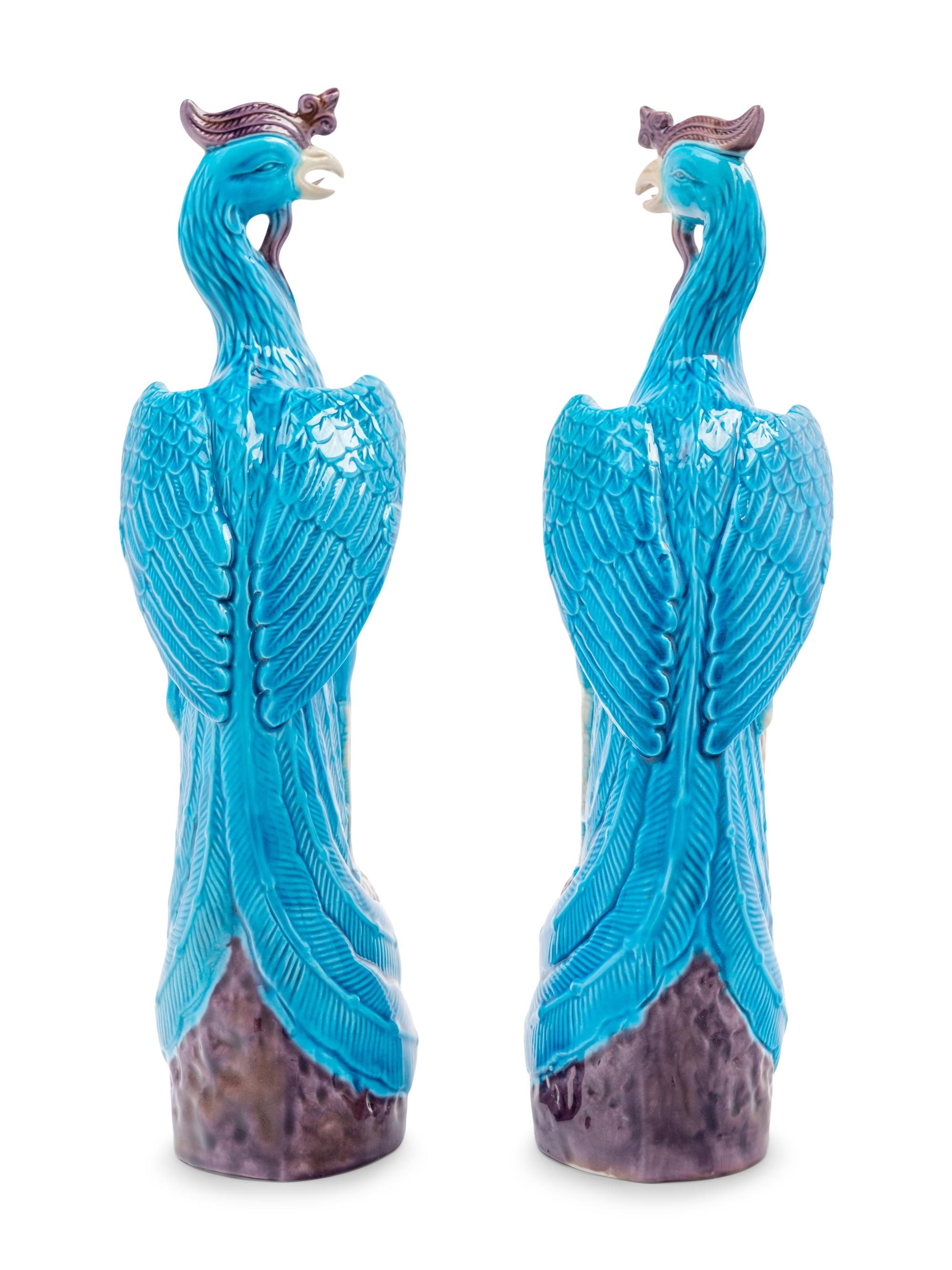 A Pair of Chinese Export Turquoise, White and Purple Glazed Porcelain Figures of Phoenixes