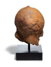 An Etruscan Terra Cotta Votive Head of a Woman