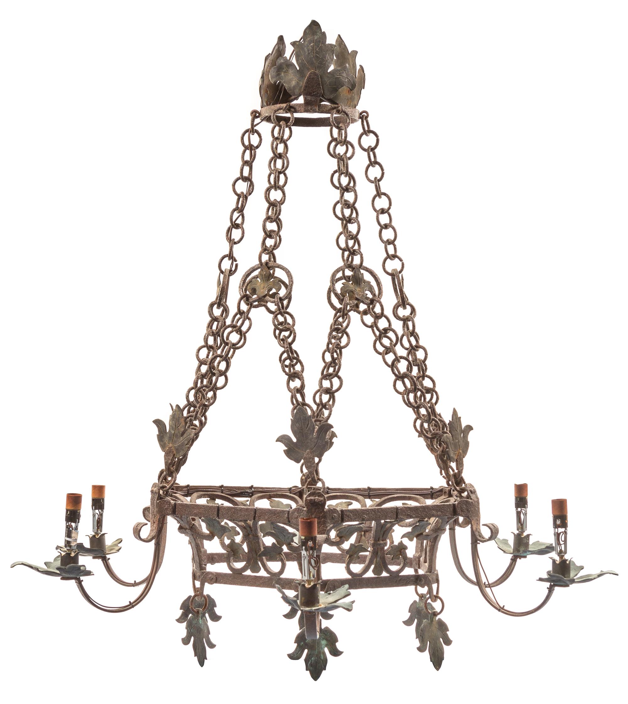 A Baroque Style Wrought Iron Six-Light Chandelier Height 51 inches. — STYLE OF ADDISON MIZNER