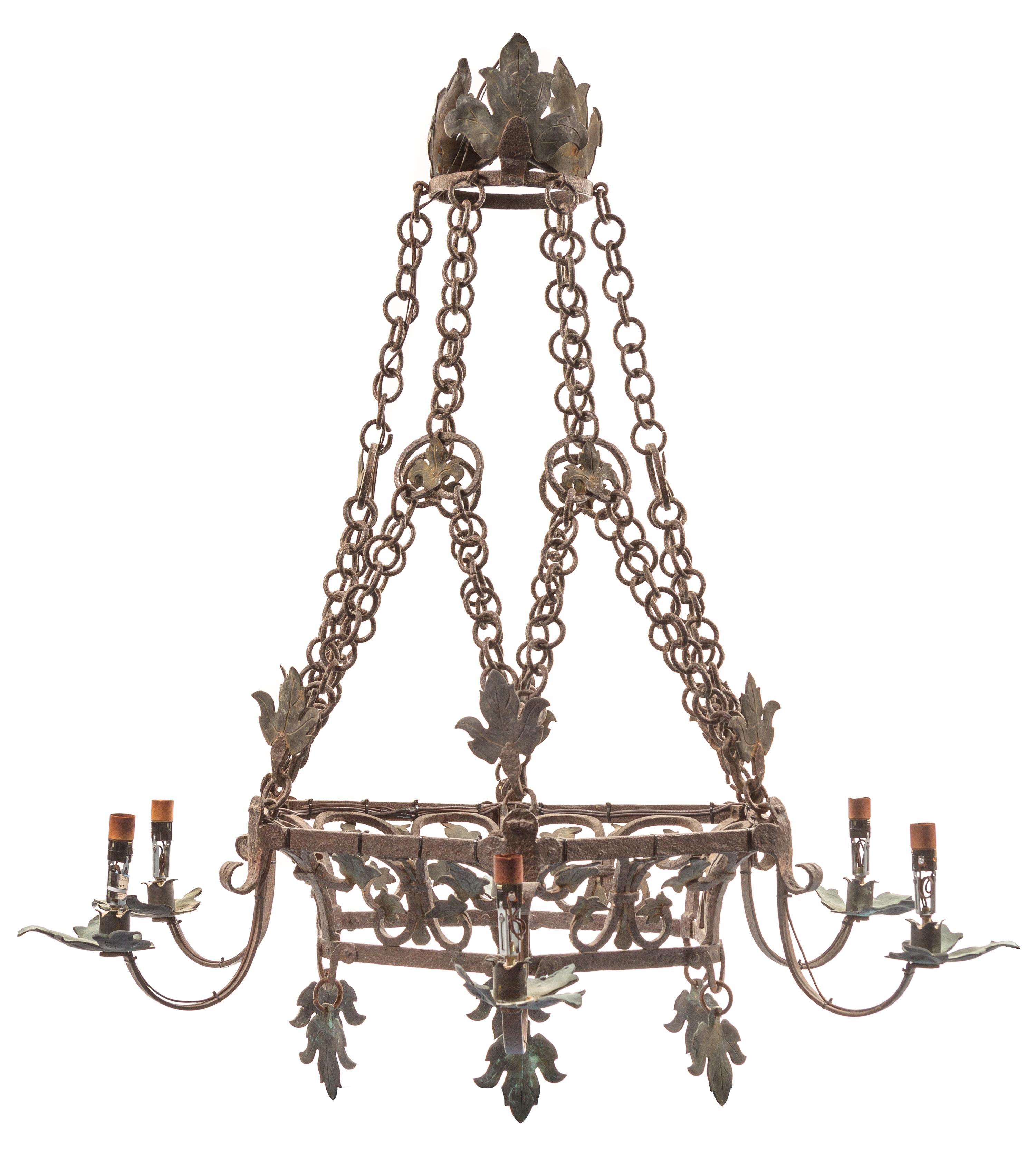A Baroque Style Wrought Iron Six-Light Chandelier Height 51 inches. — STYLE OF ADDISON MIZNER