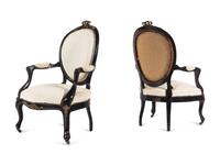 A Pair of Napoleon III Gilt Metal Mounted Ebonized Fauteuils