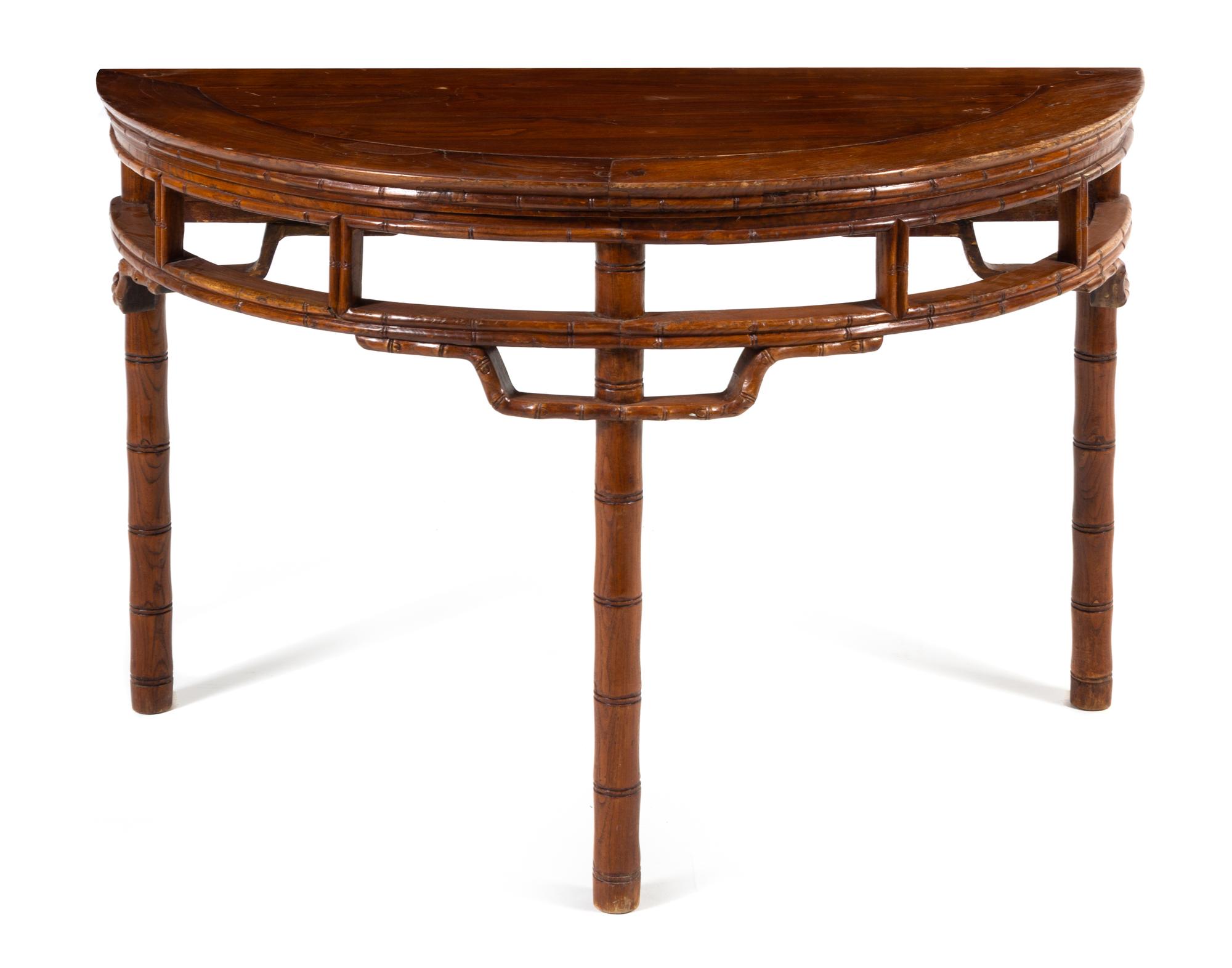 A Chinese Hardwood 'Bamboo-Motif' Demi-Lune Console Table, Banyuezhuo Height 31 1/2 x width 49 3/4 x depth 24 1/2 inches. — QING DYNASTY (1644-1911)