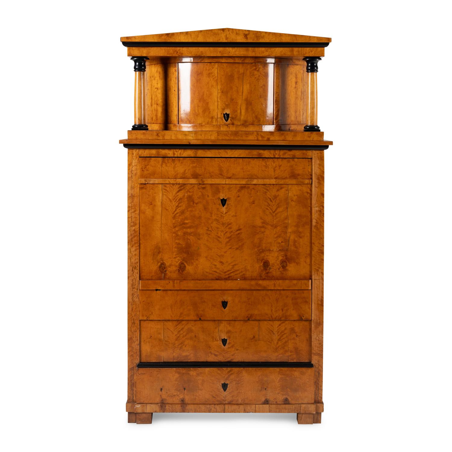 A Biedermeier Part-Ebonized Fruitwood Cabinet