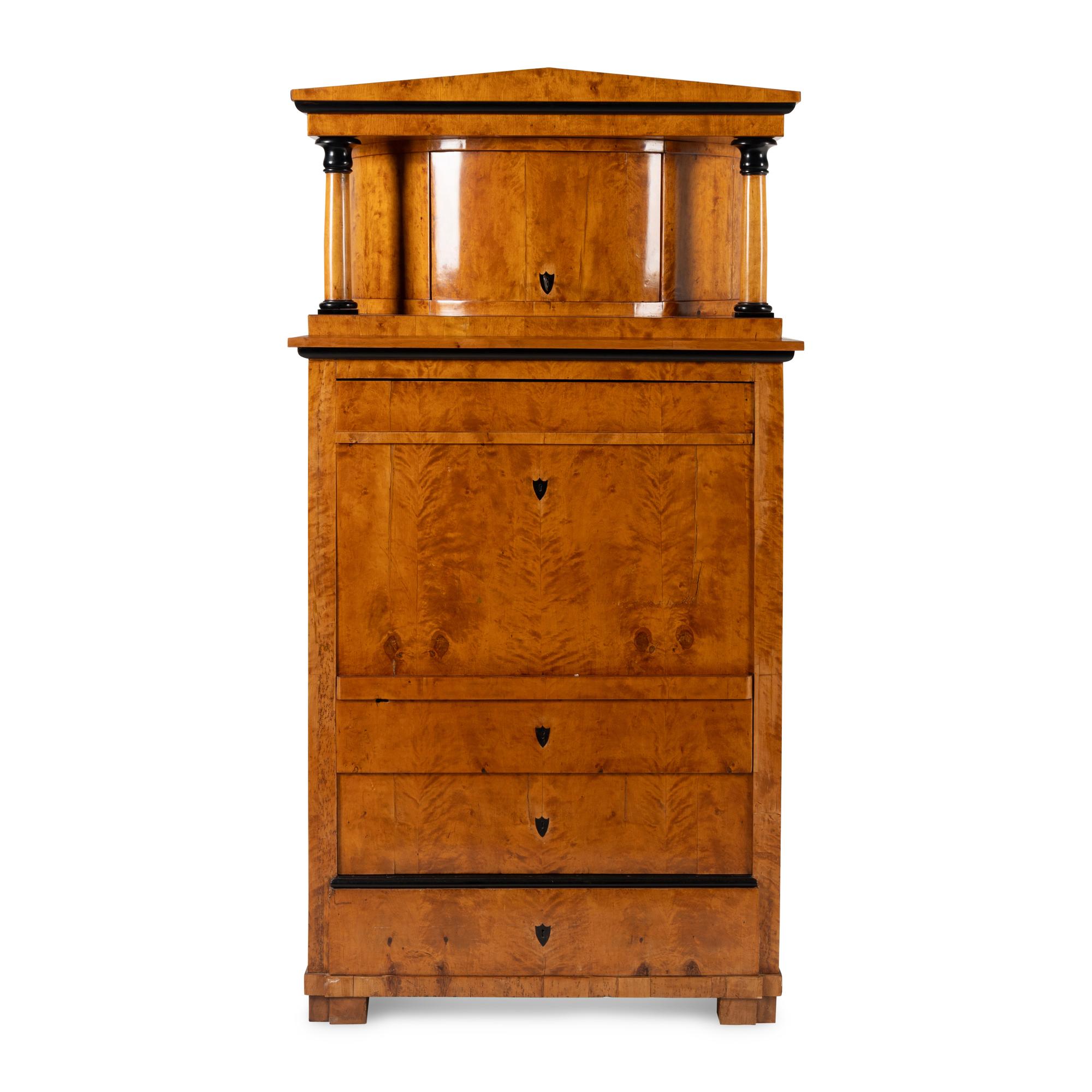 A Biedermeier Part-Ebonized Fruitwood Cabinet