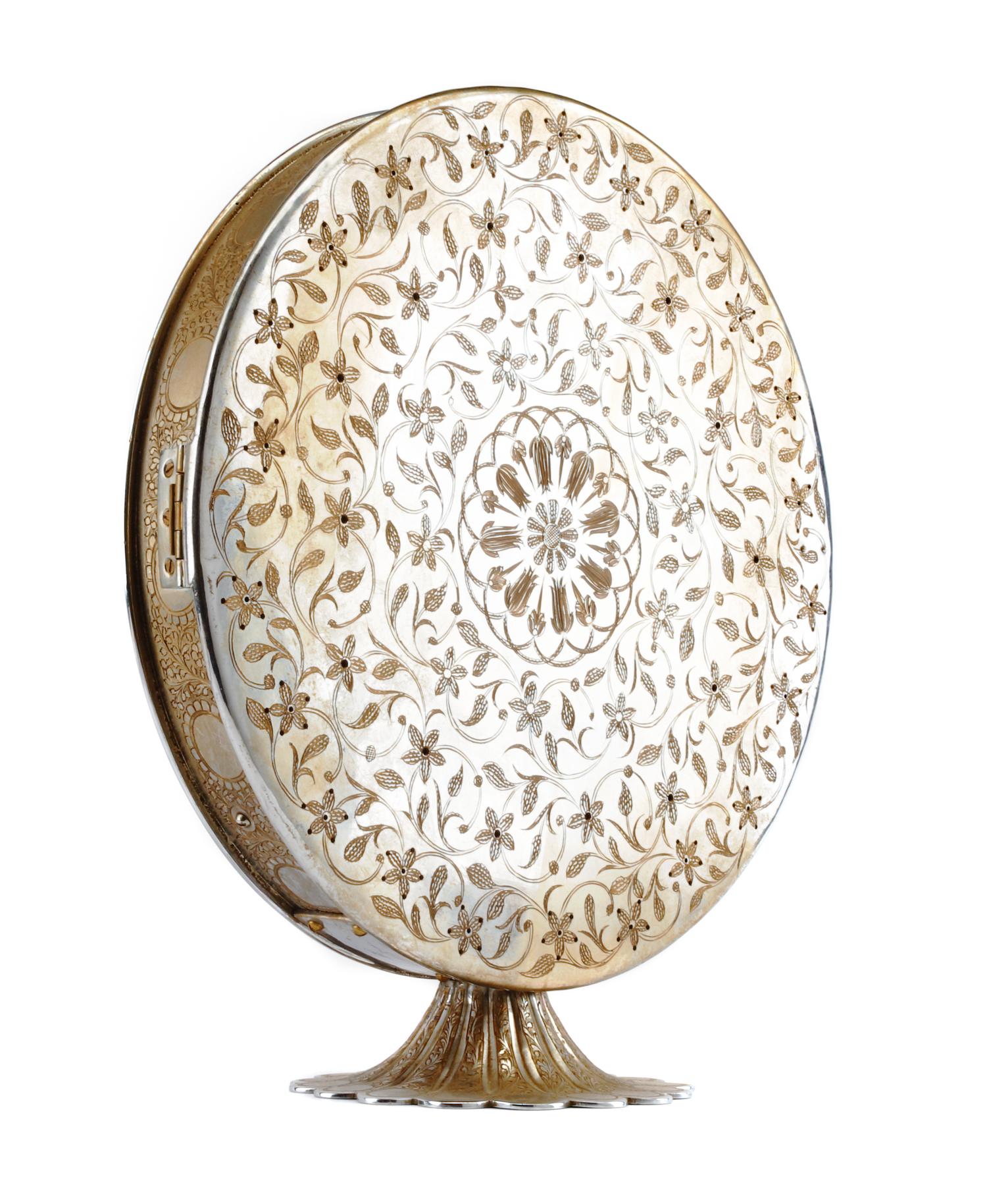 A Fred Zimbalist Twelve-Air Music Box Height 15 3/4; diameter of case 14 1/8 inches.