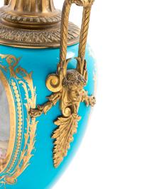 A Sèvres Style Gilt Bronze Mounted Painted and Parcel Gilt Celeste-Blue Ground Porcelain Seven-Light Candelabrum