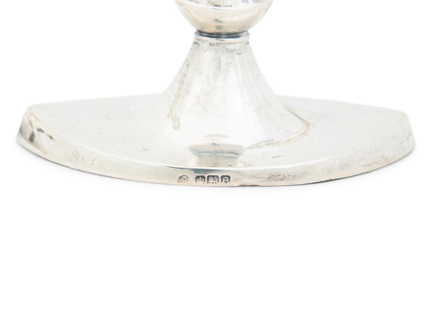 Four English Silver Weighted Candlesticks
