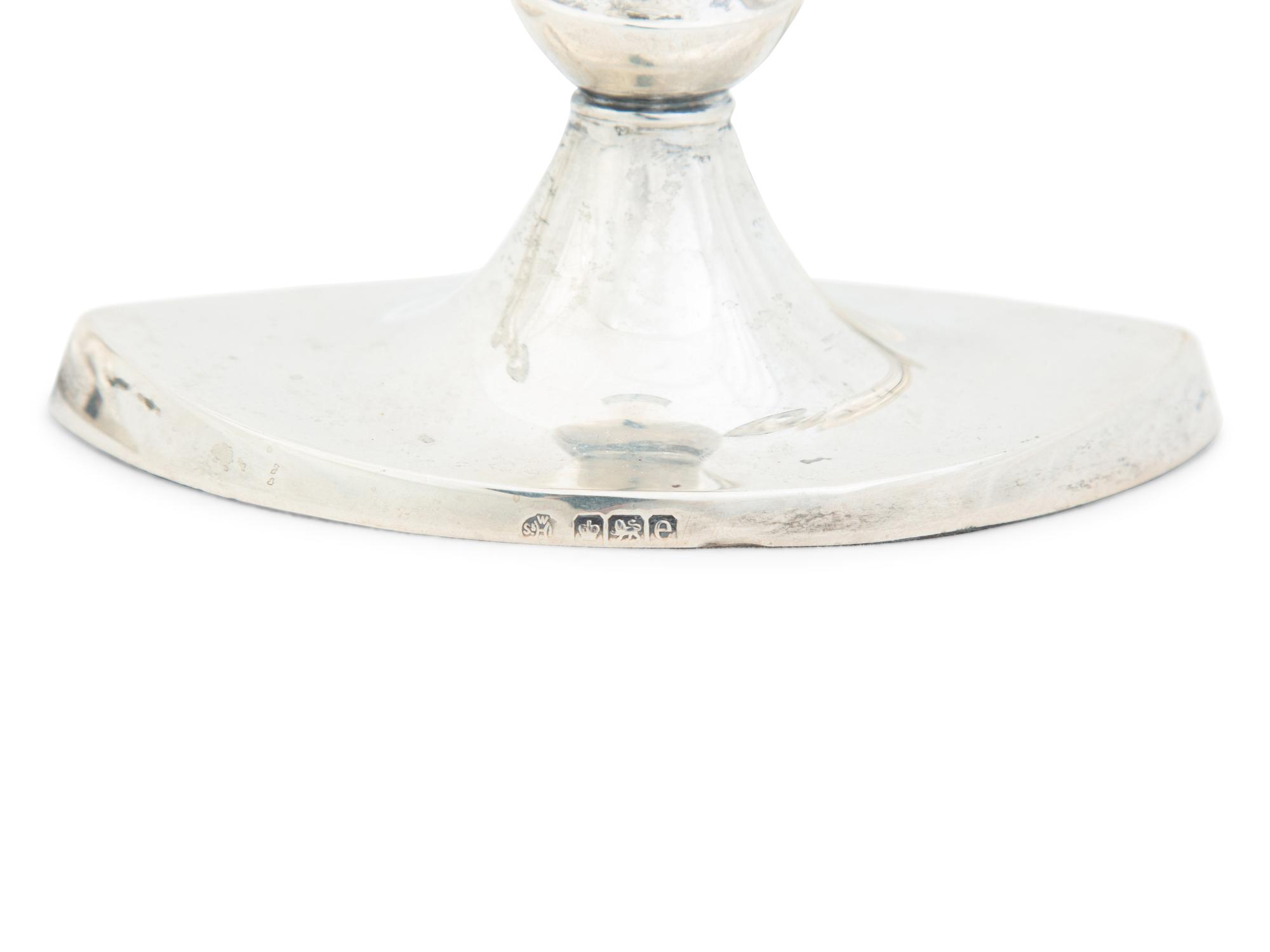 Four English Silver Weighted Candlesticks