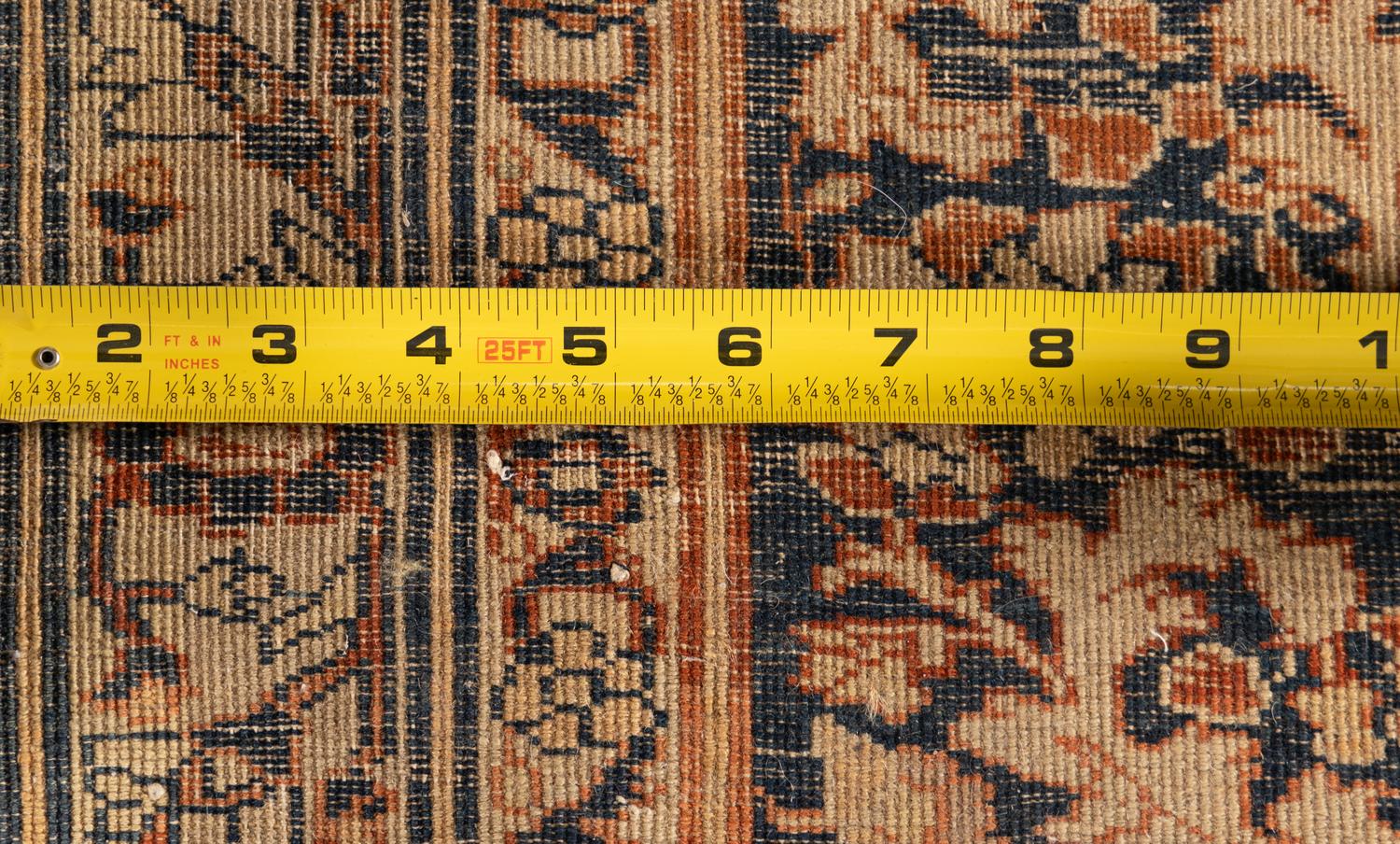 A Tabriz Wool Rug