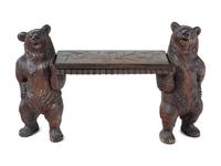 A Black Forest Carved Figural Hall Bench