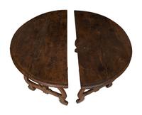 A Pair of Italian Baroque Walnut Demilune Console Tables