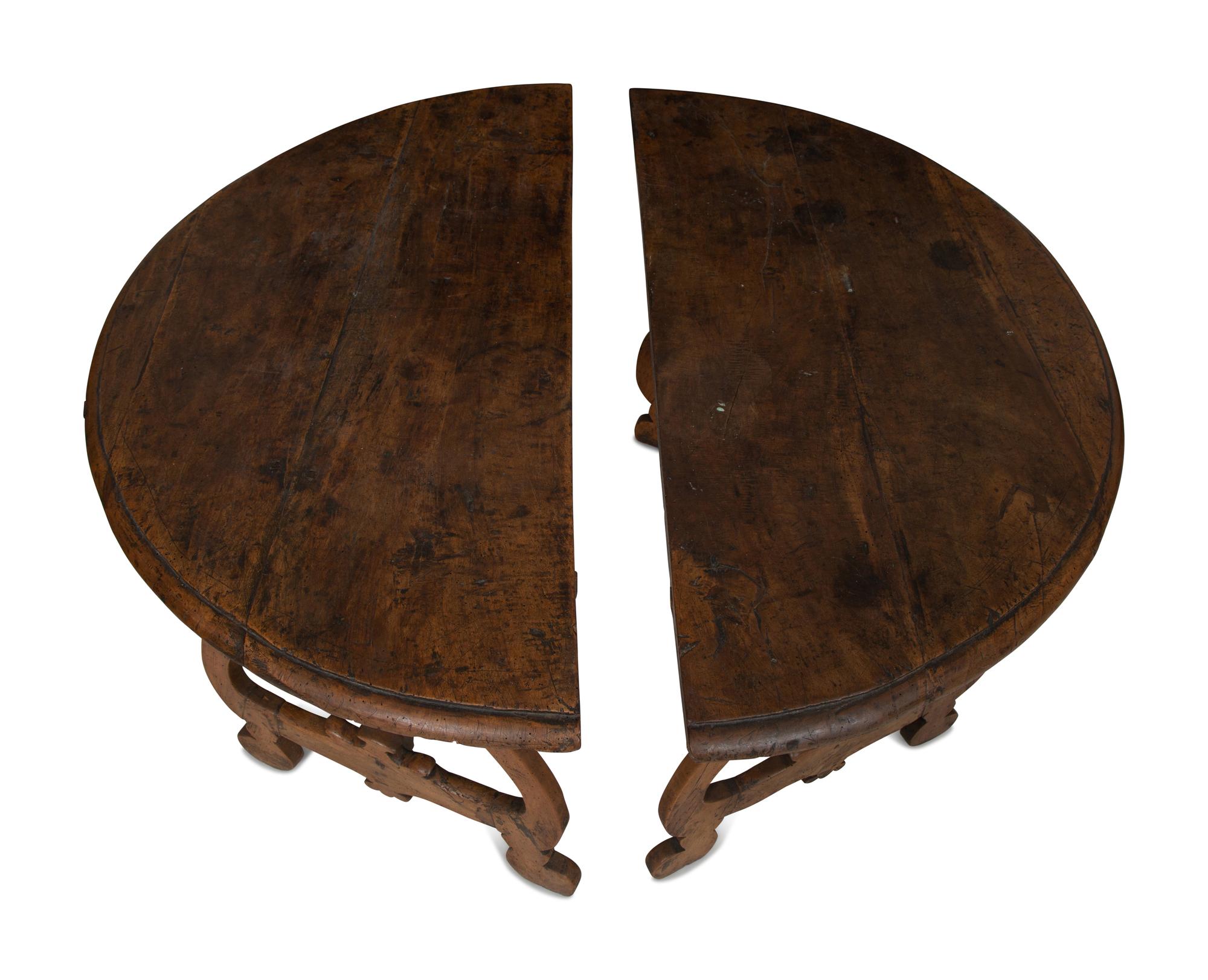 A Pair of Italian Baroque Walnut Demilune Console Tables