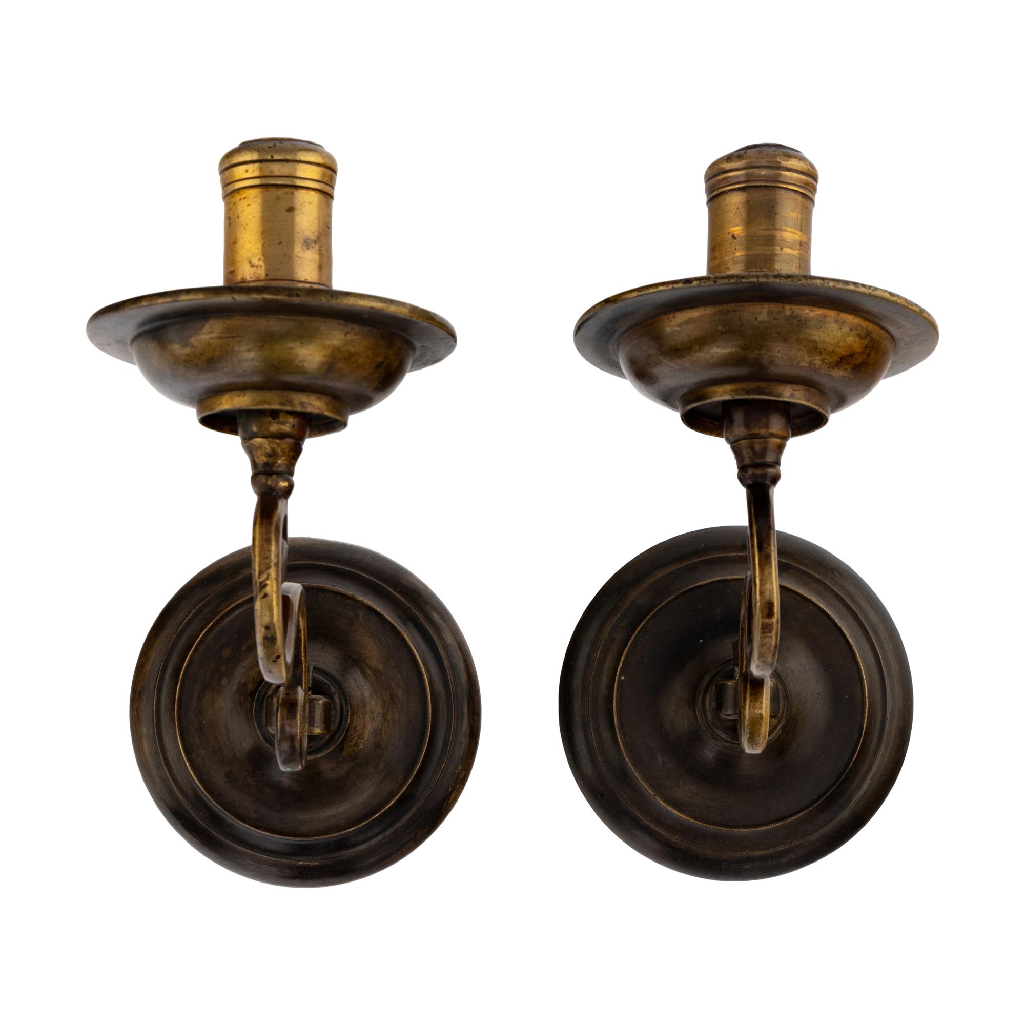 A Pair of English Brass Sconces