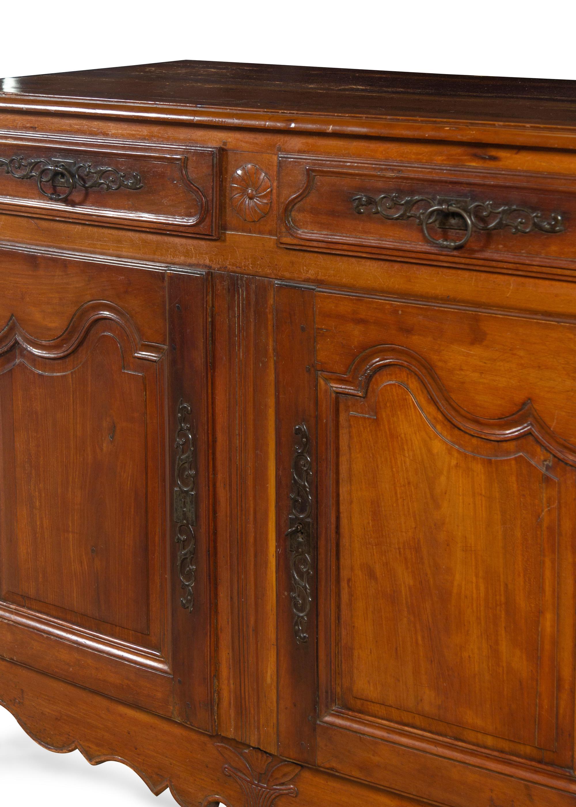 A Louis XV Provincial Style Walnut Sideboard