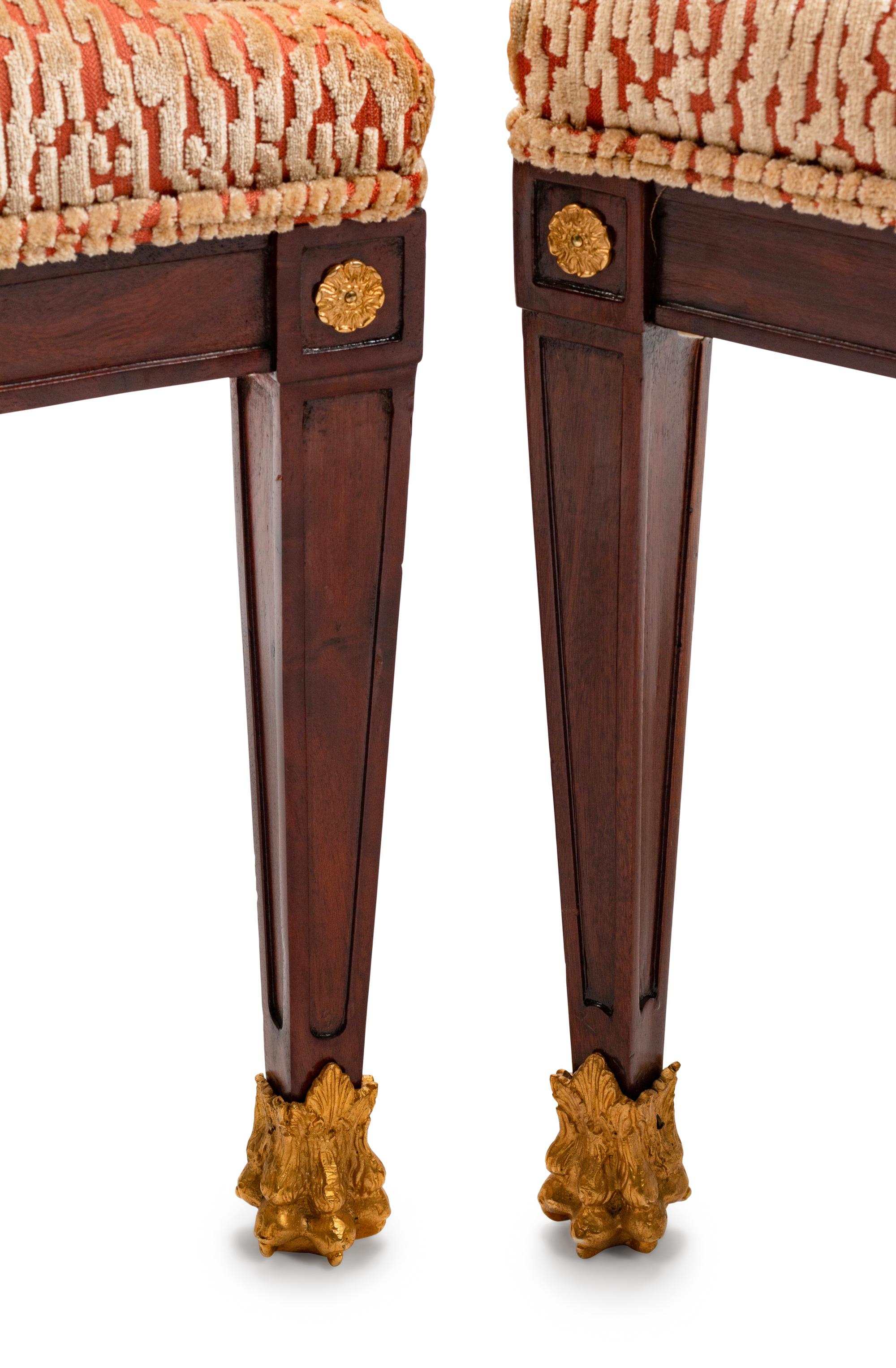 A Pair of Empire Style Gilt-Bronze-Mounted Mahogany Fauteuils