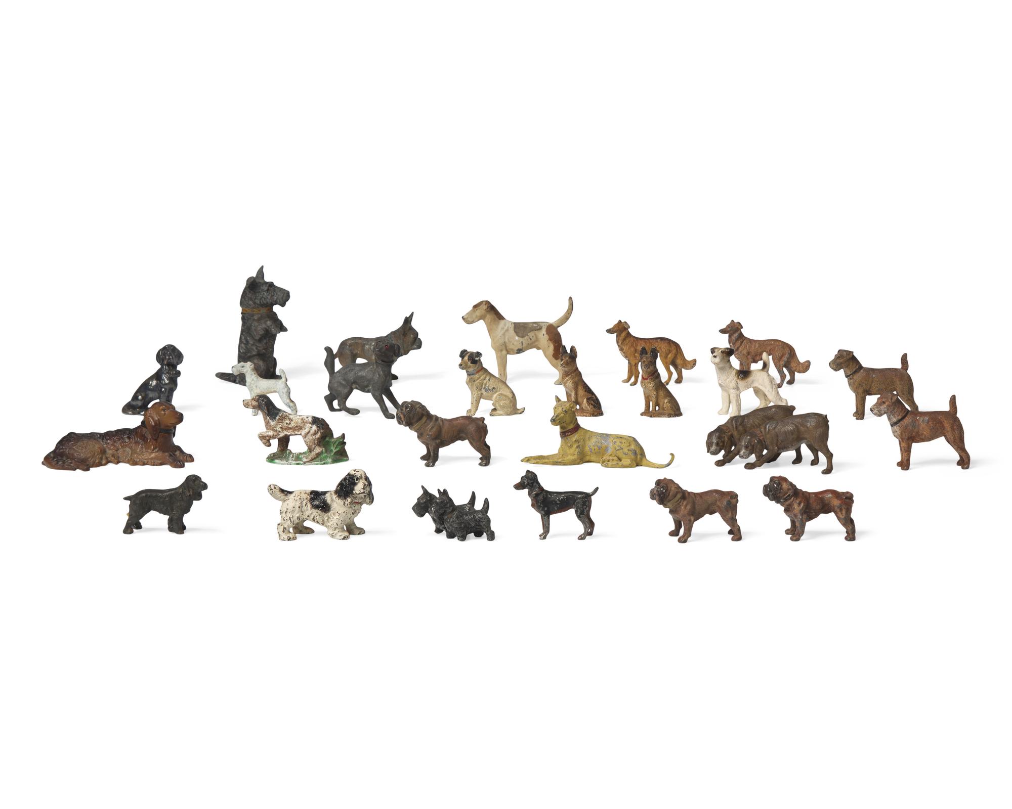A Collection of Twenty-Five Cast and Painted Metal Dog Figurines
