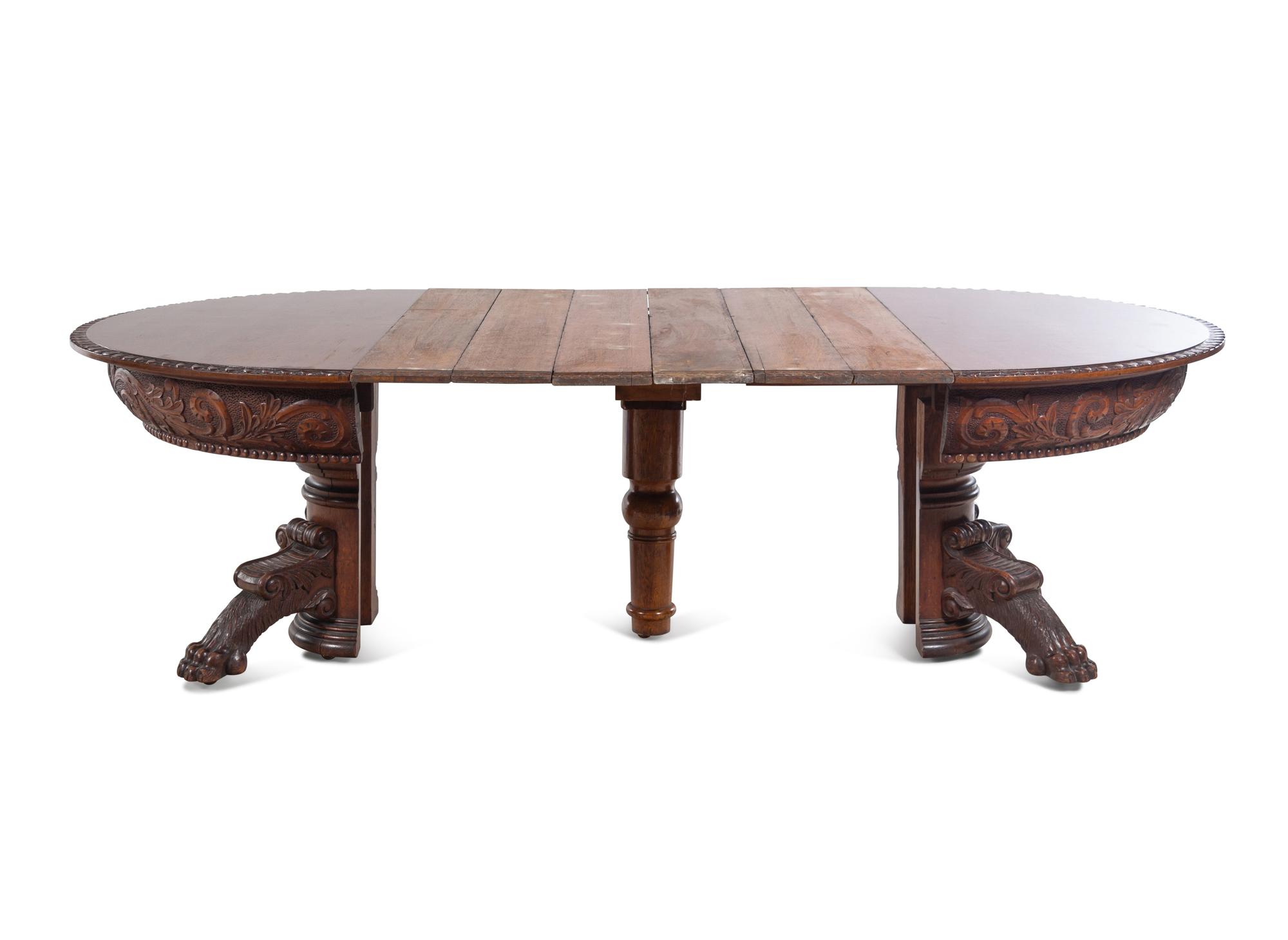 A Renaissance Revival Carved Oak Extension Table