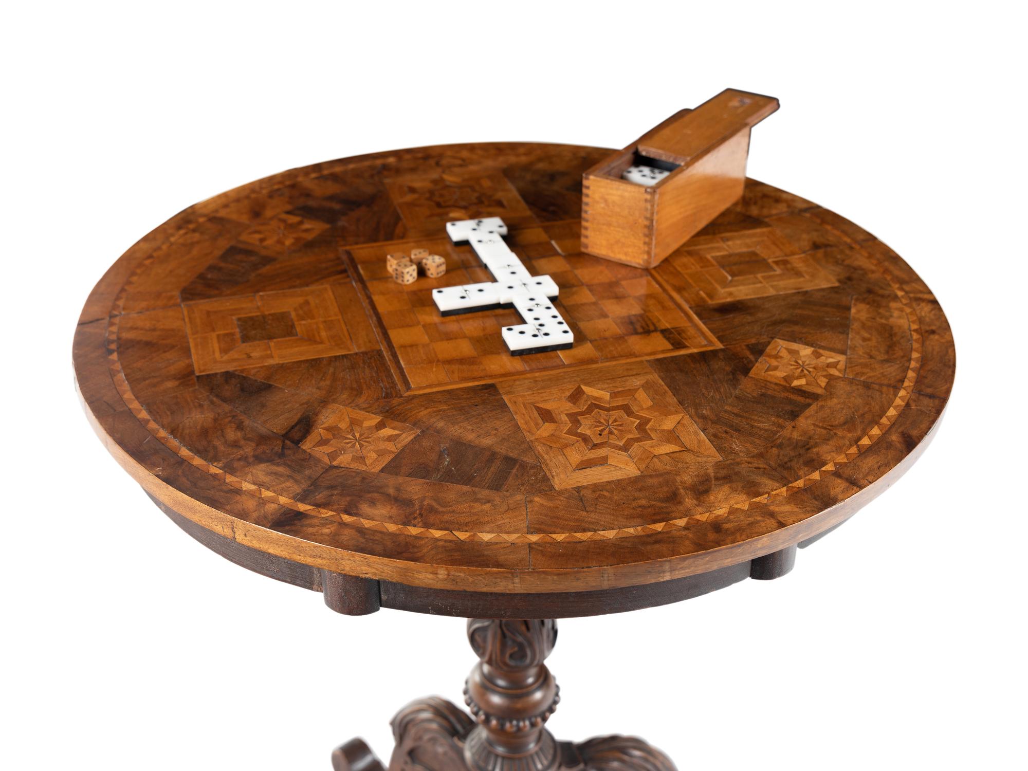 A Victorian Marquetry Game Table, Gaming Set and Treen Box