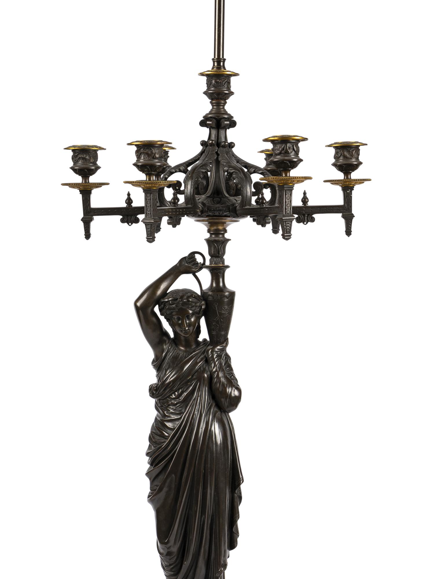 A Pair of Continental Bronze Figural Seven-Light Candelabra Mounted as Lamps