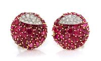 A Pair of 18 Karat Bicolor Gold, Ruby and Diamond Earclips, 11.70 dwts.