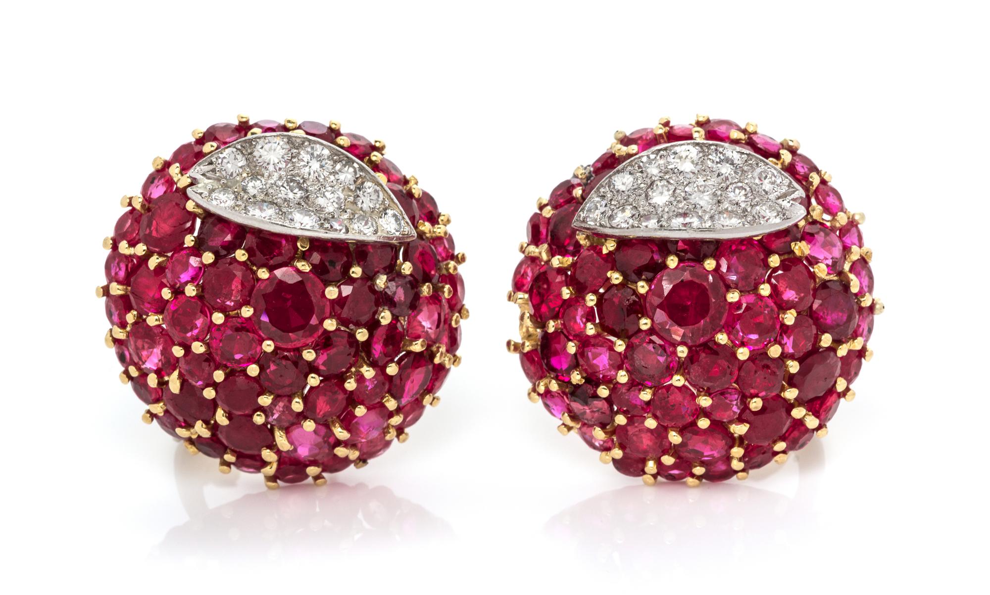 A Pair of 18 Karat Bicolor Gold, Ruby and Diamond Earclips, 11.70 dwts.
