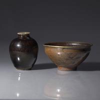 Two Chinese Dark Brown Glazed Wares, 19th Century and Earlier — 清中期及更早 醬釉罐及建盞一組