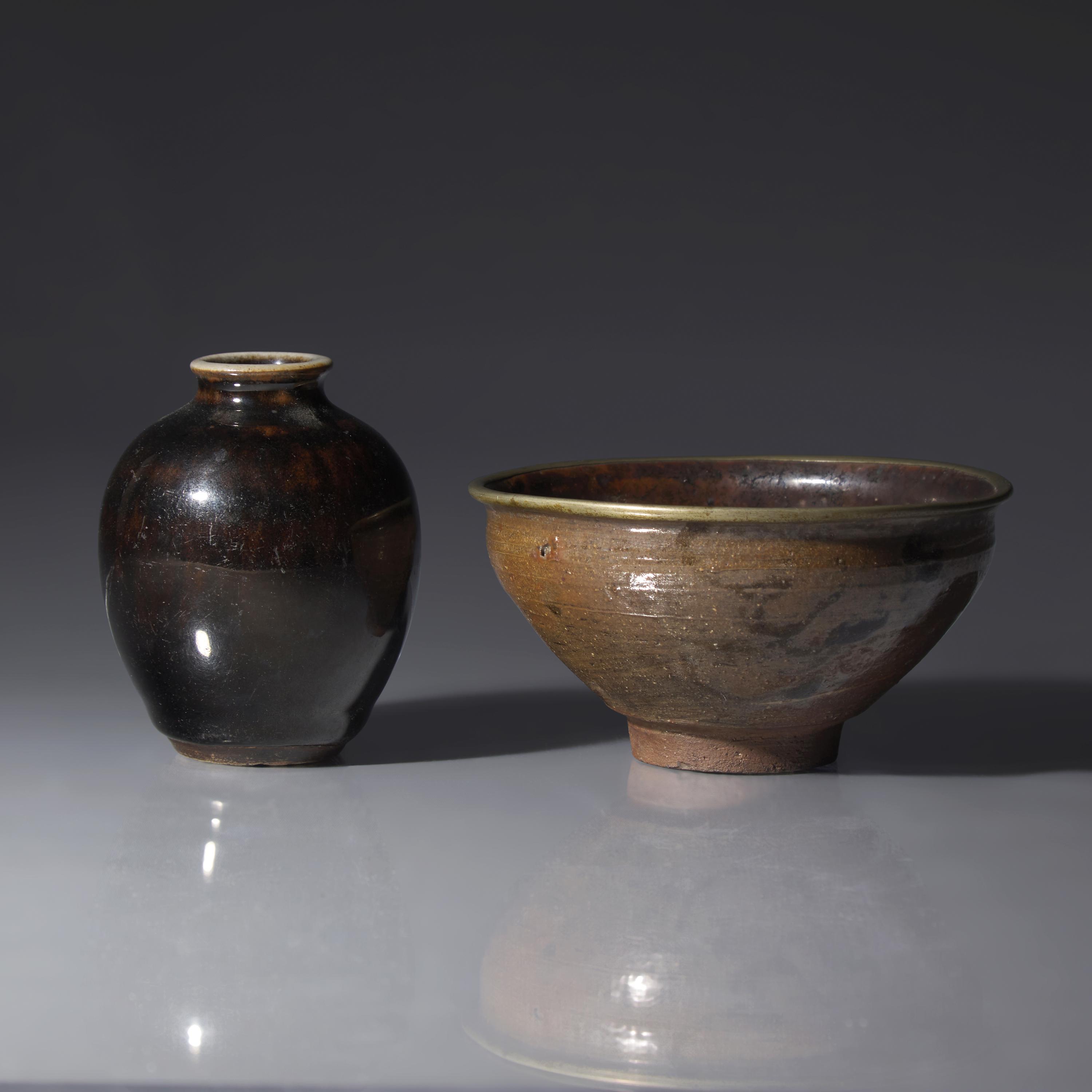 Two Chinese Dark Brown Glazed Wares, 19th Century and Earlier — 清中期及更早 醬釉罐及建盞一組