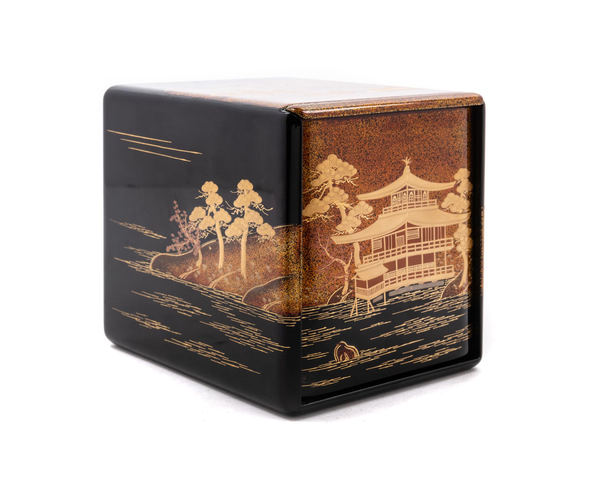 A Small Japanese Gilt and Black Lacquer Cabinet