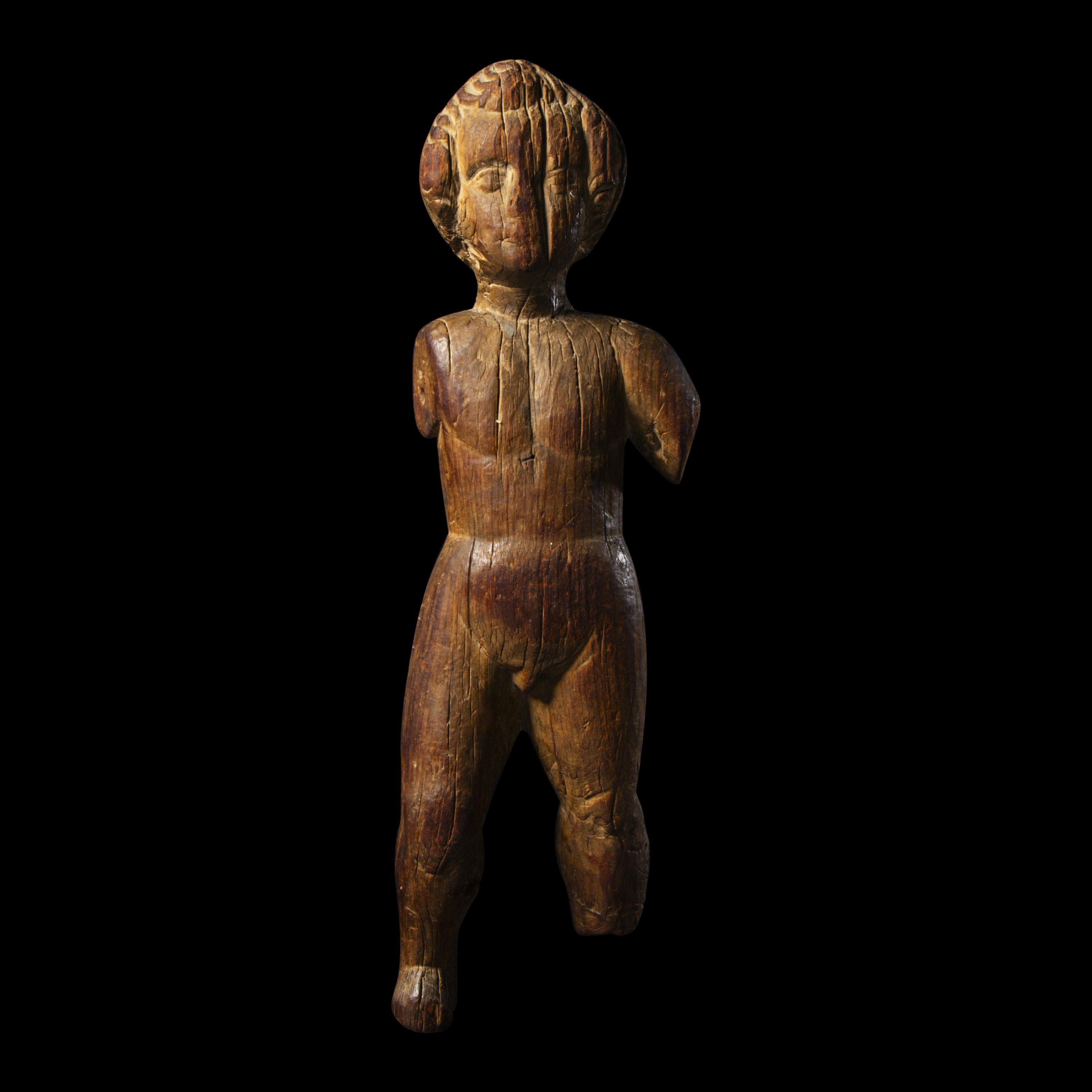 A Santo Niño Wood Figure