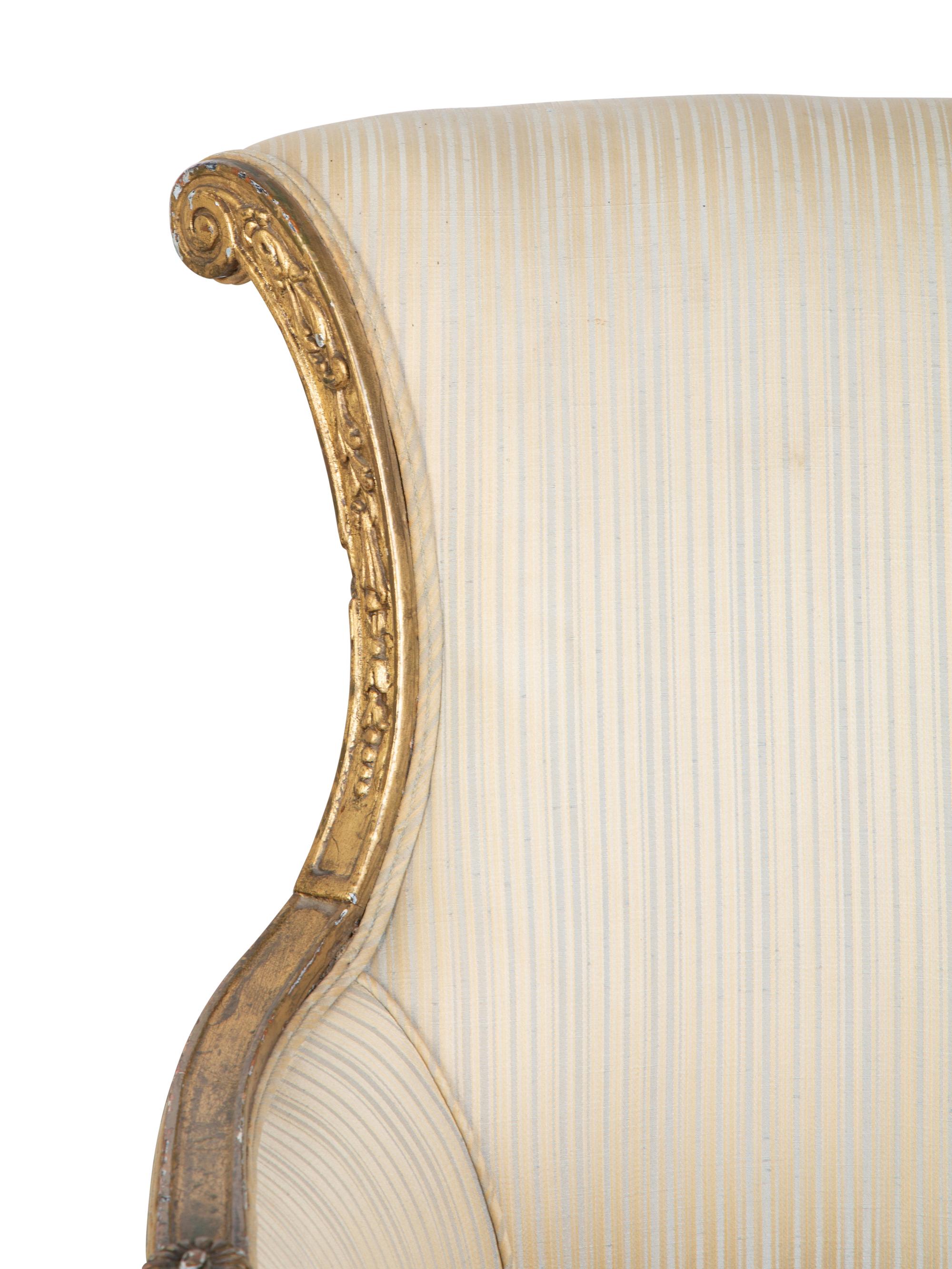 A Pair of Regency Style Giltwood Chairs — 19TH CENTURY