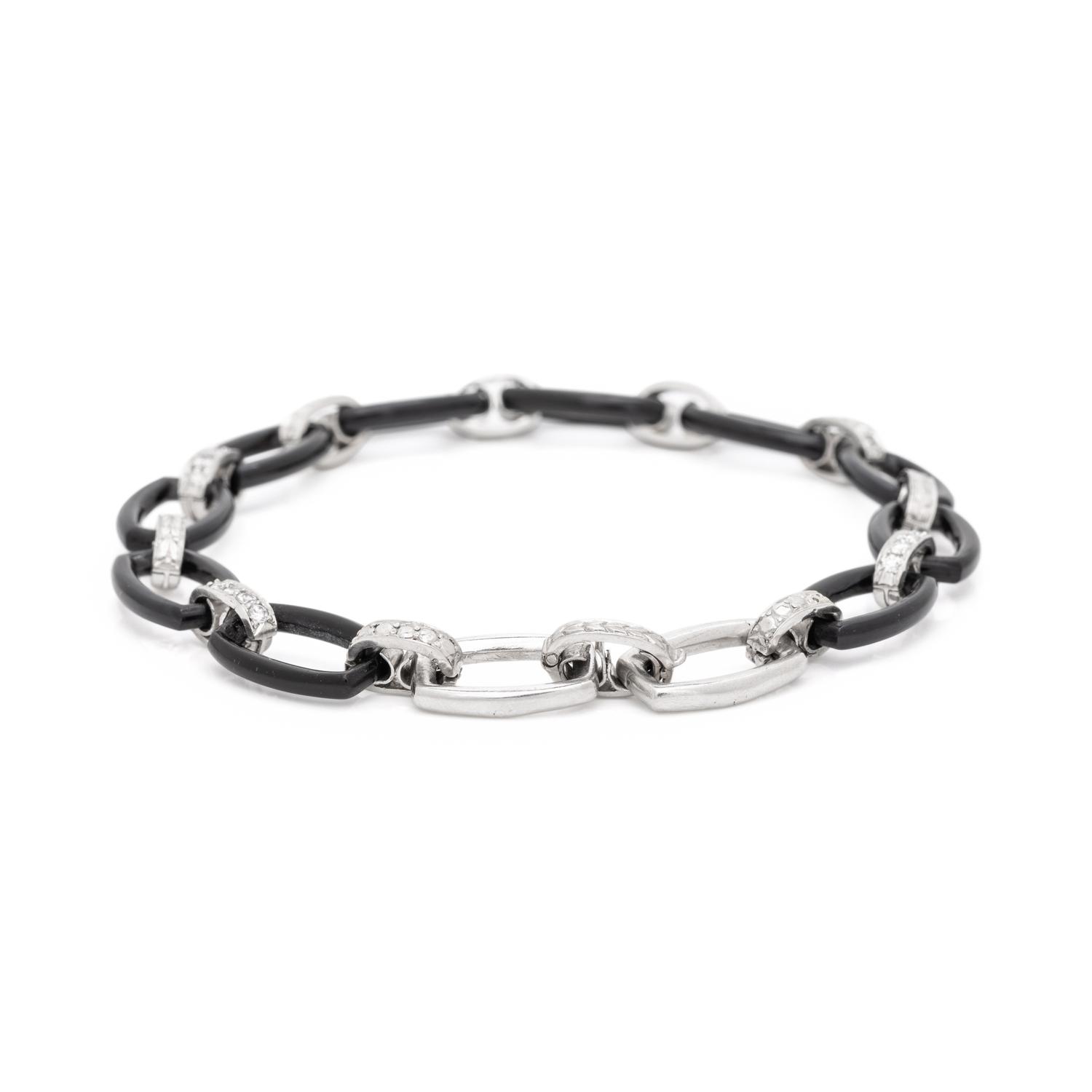 ART DECO, PLATINUM, ONYX AND DIAMOND BRACELET